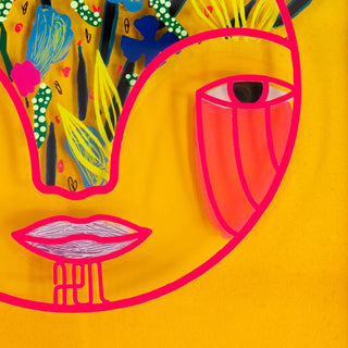Colorful abstract face design on a yellow background