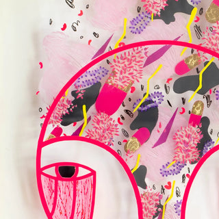 Colorful abstract design with eye-like shapes and floral patterns on a white background